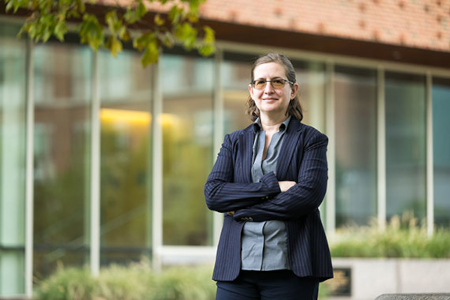 Amanda Stent standing in front of Wegmans Hall